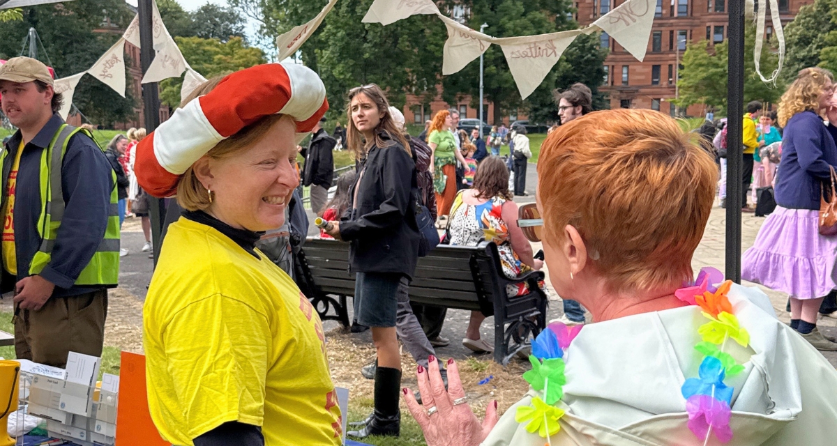 Performers on stage at Govanhill Park during the Carnival